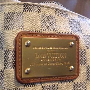 Authentic Louis Vuitton Eva Sophia cross body bag